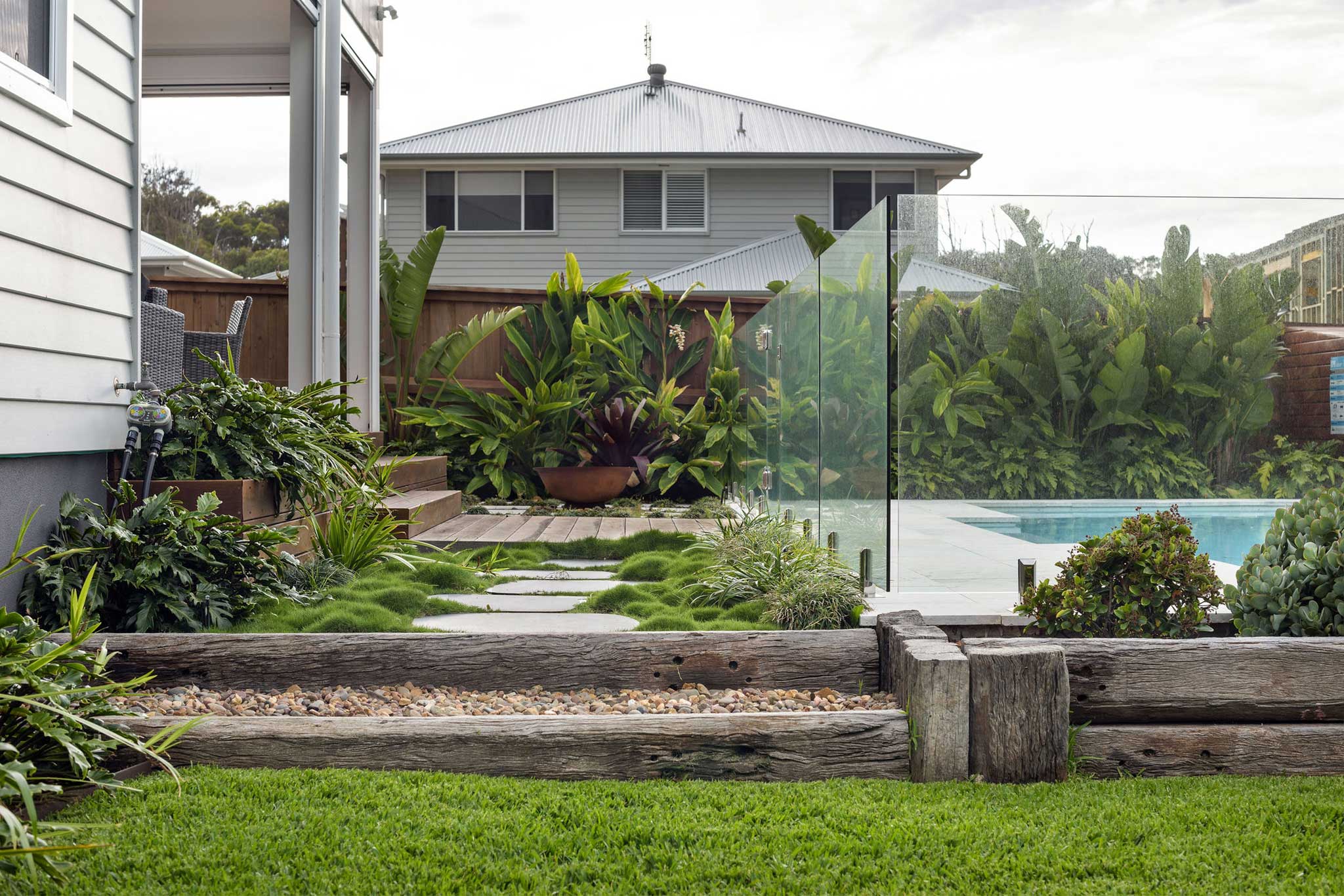 Landscape Design Construction Central Coast - Striking Oasis - Backyard pool and plants