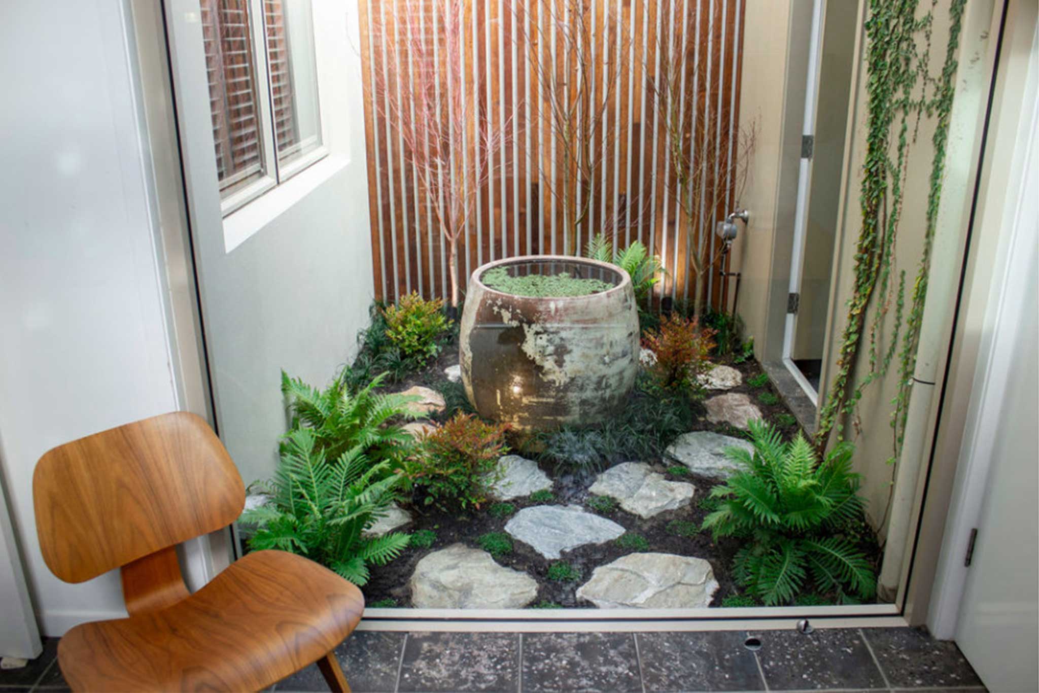 Landscape Design Construction Central Coast - Project "Nook Munday" - Atrium Courtyard from inside with urn water feature and planting